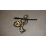 Silver brooch modelled as a ski, silver bracelet,