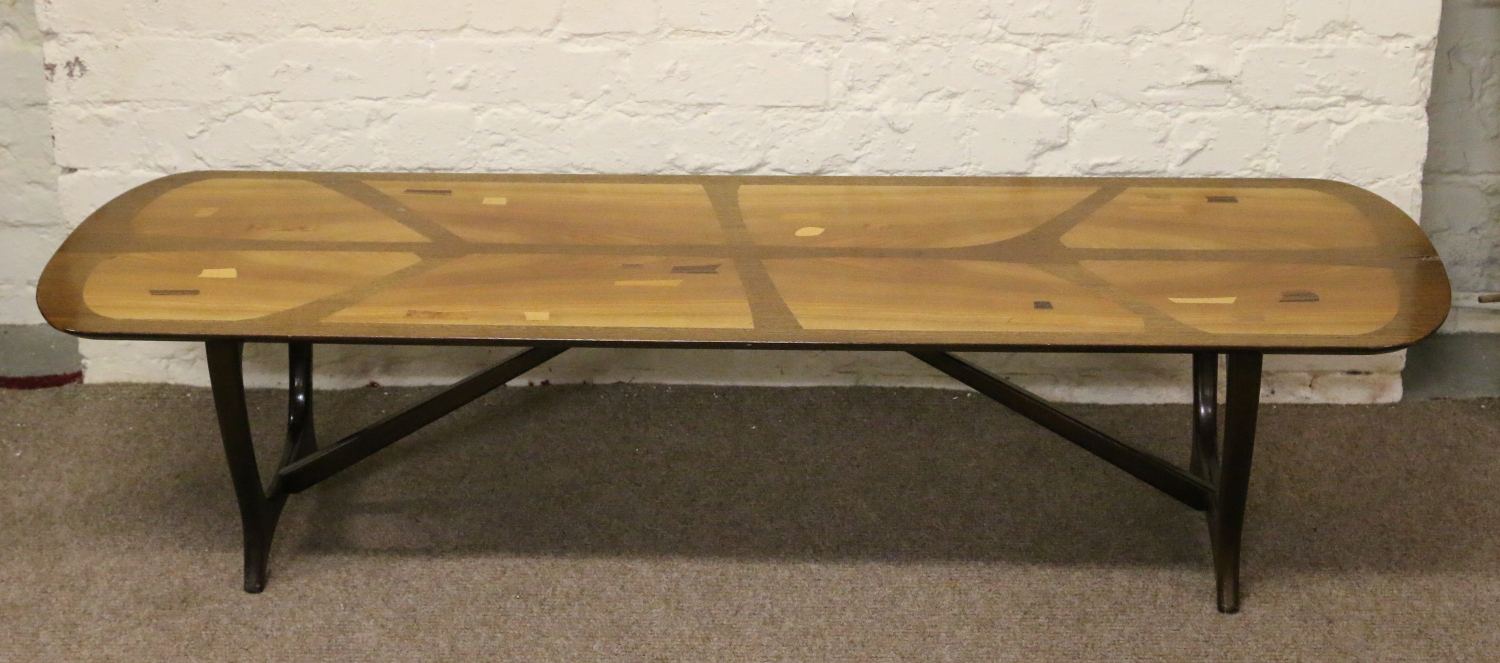 An Ercol style coffee table inlaid with specimen woods. Condition Report. To be used as a guide