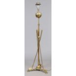 A novelty rise and fall brass standard oil lamp of golfing interest converted to electricity, 168cm.