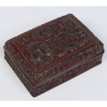 A 19th century Chinese cinnabar lacquer box and cover.