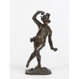 A 19th century Continental patinated bronze figure of a dancing man playing castanets.