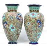 A pair of Burmantofts Faience large baluster vases.