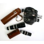 A vintage Beauliou R76 16mm cine camera and four lenses.