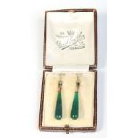 A cased pair of 9 carat gold and spinach jade drop earrings with threaded clamp fittings, 3.5cm.