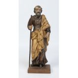 An 18th century Continental carved polychrome wood figure of a saint.