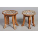 A pair of African hardwood stools with beadwork seats, 30cm. Condition Report.