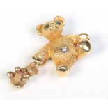 A Tiffany & Co. 18 carat gold teddy bear and cub brooch.