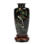 A 19th century Japanese cloisonne high shouldered vase on carved hardwood plinth.