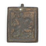 A 17th century bronze rectangular devotional pendant cast in relief with a scene depicting St