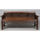 A 19th century Chinese hardwood settee.