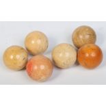 Six early 19th century turned ivory billiard balls. 780 grams, 5cm diameter.