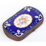 A 19th century Continental brass purse with guilloché enamelled scales decorated with a panel of