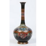 A Japanese Meiji period cloisonne vase with tall slender neck issuing from a bulbous body.