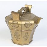 A Japanese bronze octagonal baluster shaped kettle.