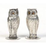 A pair of Edwardian silver novelty salt and pepper shakers by John Collard Vickery.