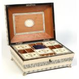 A 19th century Anglo Indian Vizagapatam ivory and penwork fitted sewing box of sarcophagus form and