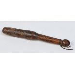 A 19th century primitive turned hardwood tipstaff, 24.5cm. Condition Report.