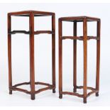 A pair of graduated Chinese hardwood ornament stands. Largest 31cm. Condition Report.