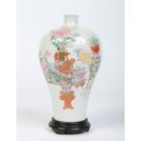 A Chinese famille rose vase on hardwood plinth and of finely potted meiping form.