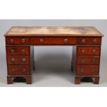 A Victorian mahogany twin pedestal desk.