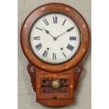 A Victorian walnut cased eight day drop dial wall clock striking hourly.