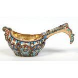 A Russian silver gilt Kovsh with lobed bowl and having enamelled and jeweled decoration.