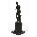 A 19th century bronze figure after antiquity of the Campo Iemini Venus raised on an ebonized wooden