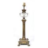 A Victorian brass based oil lamp converted to electricity.