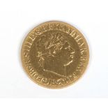 A George III 1820 sovereign. Obv. laureate head. Rev. St George and the Dragon, milled edge.