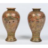 A pair of Japanese Meiji period miniature Satsuma baluster vases.