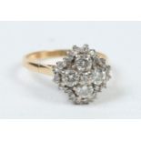 An ladies early 20th century 18 carat gold diamond cluster ring.
