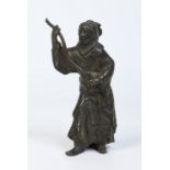 A Japanese Meiji period patinated bronze figure of a woman dressed in a kimono and holding a staff,
