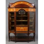 A large Art Nouveau mahogany display cabinet.