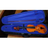 A students 3/4 violin and bow in case.