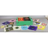 A collection of 45 rpm records to include rock, pop and folk examples by Bob Dylan, Status Quo,