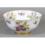 A Caverswall ceramic fruit bowl decorated with flowers.