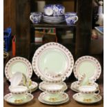 A Royal Crown Derby part tea service along with an Imperial part tea service.