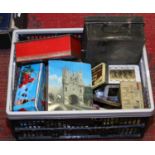 A box and contents of various vintage tins.