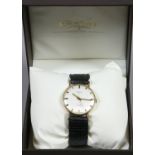 A gentleman's 9ct gold cased manual wind Rotary wristwatch with silvered dial and black leather