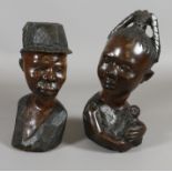 A pair of carved African hardwood figures. Largest 27cm. Condition Report.