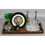 An oak tray to include green glass and brass reading lamp, silver plate, cut glasswares etc.