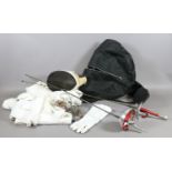 A shoulder bag and contents of sword fencing equipment by Paul.