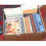 A collection of old hardback childrens books along with a collection of model railway magazines.