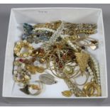 A box of mixed costume jewellery to include gate bracelet, earrings,