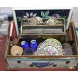 A box of various collectables to include a framed embroidery and a brass magazine rack along with