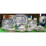 A collection of blue and white dinnerwares, meatplates, tureens, large milk jug,