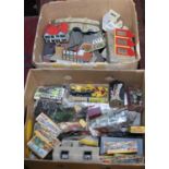 Two boxes and contents of various model railway accessories to include trackside buildings,