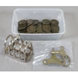A collection of pre-Decimal coins, a silver plate four bar toastrack and three clock keys.