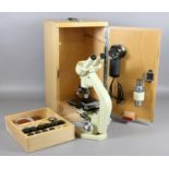 A Watson Barnet stereo and Mono Bactil 60 microscope in case with accessories.