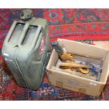 A jerry can and box of tools including a hoist, lump hammer, various spanners, etc.